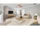Bright living room with wood floors, modern furniture, and soft, neutral decor at 124 Mcleods Way, Winter Springs, FL 32708