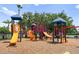 Extensive community playground with multiple slides, ladders, and features for active fun at 12917 Grovehurst Ave, Winter Garden, FL 34787