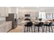 Bright kitchen with stainless steel appliances, granite counters, and an open layout at 1300 Isleta Loop, Kissimmee, FL 34741