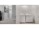 Laundry area featuring a washer and dryer adjacent to the hallway at 1300 Isleta Loop, Kissimmee, FL 34741