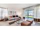 Cozy living room featuring sliding doors to the outdoors and stylish decor at 1300 Isleta Loop, Kissimmee, FL 34741