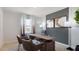 Home office featuring a sleek desk, modern decor, and natural light at 1300 Isleta Loop, Kissimmee, FL 34741