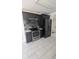 Modern kitchen features stainless steel appliances and dark cabinets at 1321 Carey Glen Cir, Orlando, FL 32824