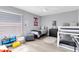 Bright and playful bedroom with bunk beds, fun decor, and plenty of space for toys and activities at 1324 Saddleridge Dr, Orlando, FL 32835