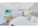 Light and airy main bedroom featuring a closet with a sliding barn door and wood-look flooring at 1324 Saddleridge Dr, Orlando, FL 32835