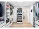 Organized walk-in closet with custom shelving and drawers, offering plenty of storage space at 1324 Saddleridge Dr, Orlando, FL 32835