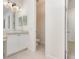 View of a clean bathroom, featuring toilet, vanity, mirror, and open doorway at 1333 Killbricken Cir, Ormond Beach, FL 32174