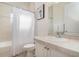 Bathroom featuring a shower-tub combo, toilet, and vanity with a mirror at 1333 Killbricken Cir, Ormond Beach, FL 32174