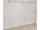Empty closet with white walls, neutral carpet, wire shelves and baseboards at 1333 Killbricken Cir, Ormond Beach, FL 32174