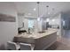 Bright kitchen with granite counters, stainless appliances, and pendant lighting at 14400 Saint Georges Hill Dr, Orlando, FL 32828