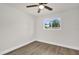 Clean room with wood-look flooring, windows, and natural light at 1491 Granada Ave, Daytona Beach, FL 32117