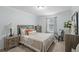 Comfortable bedroom with calming colors, plush bedding, and coordinated furnishings for a restful retreat at 1553 Caterpillar St, St Cloud, FL 34771