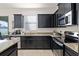 Well-equipped kitchen with granite countertops and ample cabinet space at 1553 Caterpillar St, St Cloud, FL 34771