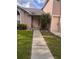 A charming single-Gathering home featuring a well-manicured lawn and inviting walkway at 1603 Emily Ct, Kissimmee, FL 34744