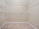 Walk-in closet with shelving at 1610 Mohegan Blvd, Kissimmee, FL 34744