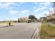 Community entrance gate with a yellow barrier, enhancing security at 1610 Mohegan Blvd, Kissimmee, FL 34744