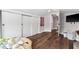 Bedroom with hardwood flooring and closet doors providing ample storage space at 1625 S Eola Dr, Orlando, FL 32806