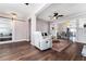 Cozy living room featuring an open floor plan, stylish furnishings, and hardwood floors at 1625 S Eola Dr, Orlando, FL 32806