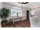 Bright living room featuring hardwood floors, a large window, and stylish interior doors at 1625 S Eola Dr, Orlando, FL 32806