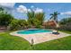 Inviting pool and paved patio in a well-maintained backyard at 1625 S Eola Dr, Orlando, FL 32806