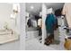 Well-organized walk-in closet featuring built-in shelving and ample storage space at 1821 Windsor Dr, Winter Park, FL 32789