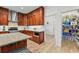 The kitchen showcases wood cabinets, stainless steel appliances, and a well-stocked pantry at 1821 Windsor Dr, Winter Park, FL 32789