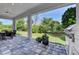 The spacious outdoor kitchen has an expansive green lawn with manicured landscaping at 1821 Windsor Dr, Winter Park, FL 32789
