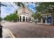 A brick street showcasing a building with a classical architecture and downtown charm at 1821 Windsor Dr, Winter Park, FL 32789