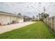 Expansive backyard featuring a patio, lawn, and a privacy fence at 2 Pirates Cv, Ormond Beach, FL 32176