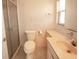 Bathroom featuring a shower, toilet, vanity, and tile flooring at 2 Pirates Cv, Ormond Beach, FL 32176