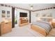 Bright bedroom with a bed, TV, toys and decor at 2 Pirates Cv, Ormond Beach, FL 32176