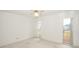 Bedroom with carpet, bright windows, and a ceiling fan at 2 Pirates Cv, Ormond Beach, FL 32176