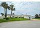 Inviting single-story home featuring a well-manicured lawn and attached two-car garage at 2 Pirates Cv, Ormond Beach, FL 32176