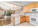 Well-lit kitchen with appliances and an open view to the living area at 2110 Stockton Dr, Sanford, FL 32771