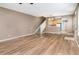 Open floorplan featuring modern floors and a staircase to the second floor at 2110 Stockton Dr, Sanford, FL 32771