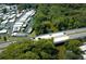 Aerial view of a waterfront community with canal access and lush greenery at 229 Rue De Fontaine, Tavares, FL 32778