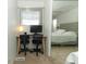 Bedroom with a computer desk and two chairs, perfect for a home office at 229 Rue De Fontaine, Tavares, FL 32778