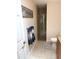 Bathroom with a glass shower, granite countertop, and tiled floor at 2299 Hawks Cove Cir, New Smyrna Beach, FL 32168