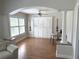 Open floor plan with plantation shutters, ceiling fan, and modern finishes at 2299 Hawks Cove Cir, New Smyrna Beach, FL 32168