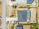 Birds eye view of this beautiful property featuring a swimming pool, hot tub, covered lanai, and boat parking at 2397 Albury Ave, Deltona, FL 32738