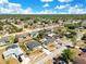 Wide aerial shot of neighborhood highlighting a home with mature landscaping, and boat parking at 2397 Albury Ave, Deltona, FL 32738