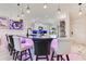 Stylish kitchen with modern lighting, black countertops, and a sleek bar area with seating at 2397 Albury Ave, Deltona, FL 32738