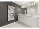Elegant bathroom featuring double sinks, a large mirror, and a tiled shower at 2949 Clever Ln, Winter Park, FL 32792