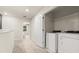 Upstairs laundry room features a modern washer and dryer set, and wire shelving at 2949 Clever Ln, Winter Park, FL 32792