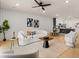 Bright living room with recessed lighting, a modern ceiling fan, and luxury vinyl plank flooring at 2949 Clever Ln, Winter Park, FL 32792
