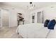 Bright main bedroom showcasing an open ensuite bathroom and modern decor at 2949 Clever Ln, Winter Park, FL 32792