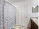 Bathroom with shower, neutral color scheme and granite countertops at 3216 Casa Del Rey Ave, Kissimmee, FL 34746