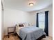 Comfortable bedroom with plush carpet, a bright window and a stylish blue bed set at 3216 Casa Del Rey Ave, Kissimmee, FL 34746