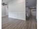 Bright living room with luxury vinyl plank flooring, custom trim, and neutral paint at 352 Inglenook Cir, Winter Springs, FL 32708
