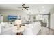 Spacious living room, dining area and kitchen offer an open living space at 38 Malauka Dr, Ocklawaha, FL 32179